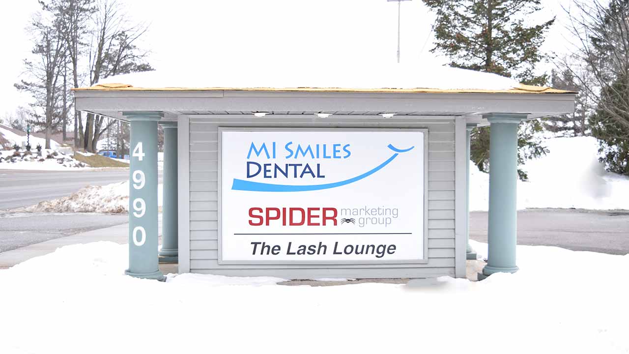 The Mi Smiles Cascade Front Sign